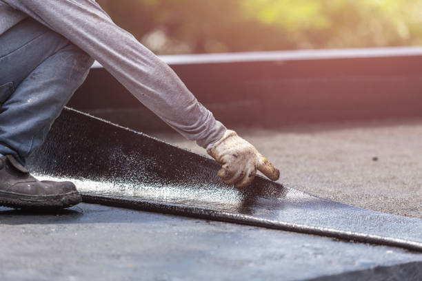 Professional Basement Waterproofing technician working in Centreville, AL